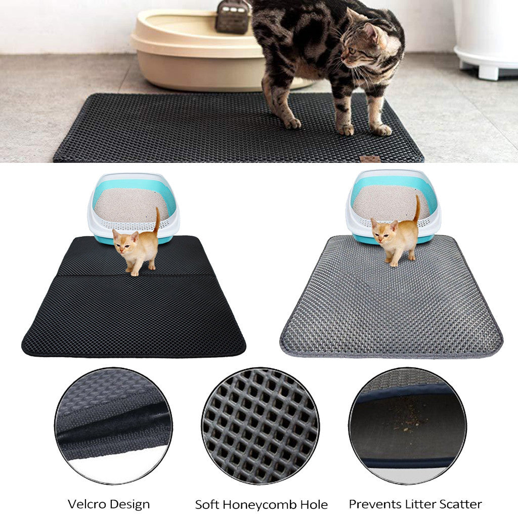 Double-layer cat litter trapping mat with soft honeycomb holes, velcro design, and waterproof layer preventing litter scatter in black and gray colors.